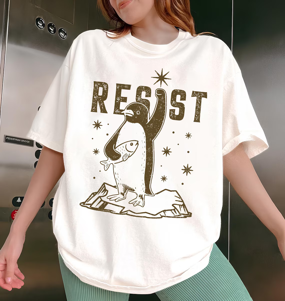 Penguins Against Tariffs T-shirts